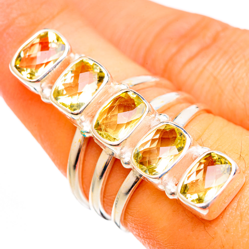Faceted citrine ring with five oval yellow stones in 925 sterling silver band
