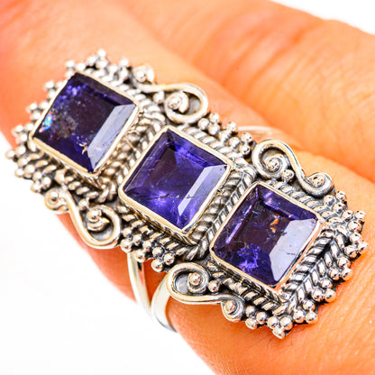 Ornate 925 sterling silver three-stone ring with violet faceted spinel squares