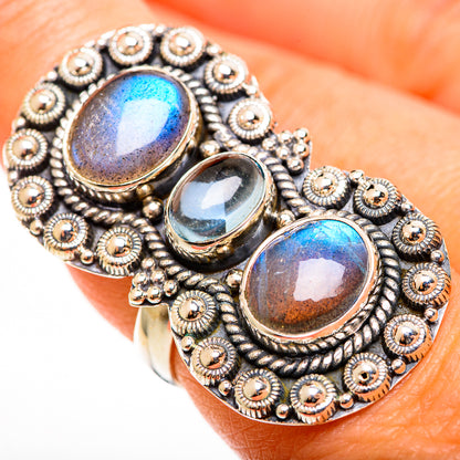 Sterling silver ring with three oval labradorite-style stones and ornate beaded border