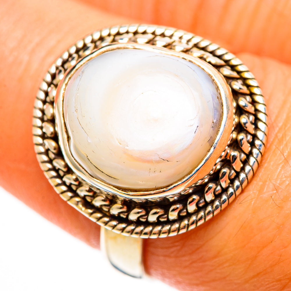 Mother-of-Pearl oval cabochon ring with rope-like bezel and textured edge