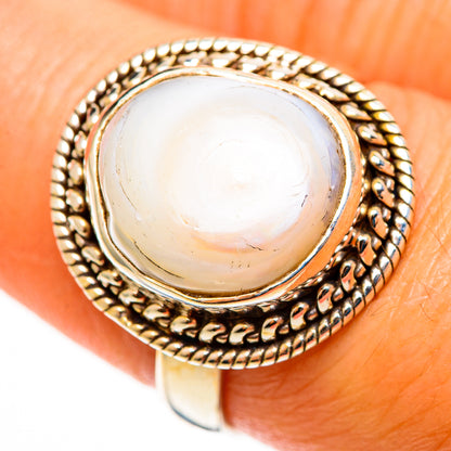 Mother-of-Pearl oval cabochon ring with rope-like bezel and textured edge