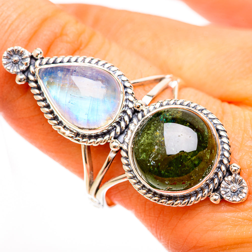 Sterling silver ring with green tourmaline and pale iridescent oval moonstone, side accents