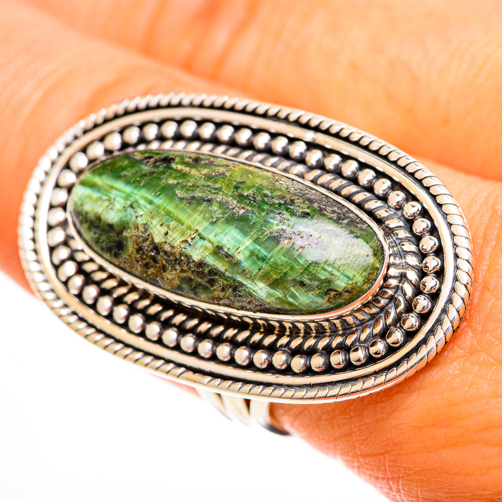 Large oval green opal ring in 925 sterling silver with raised bezel and beaded border