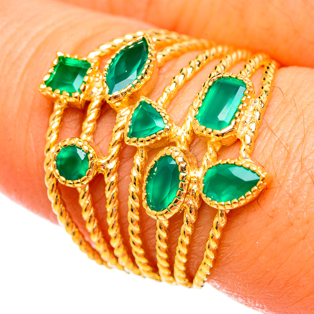 Gold-plated green onyx ring with oval and pear stones in gold lattice setting