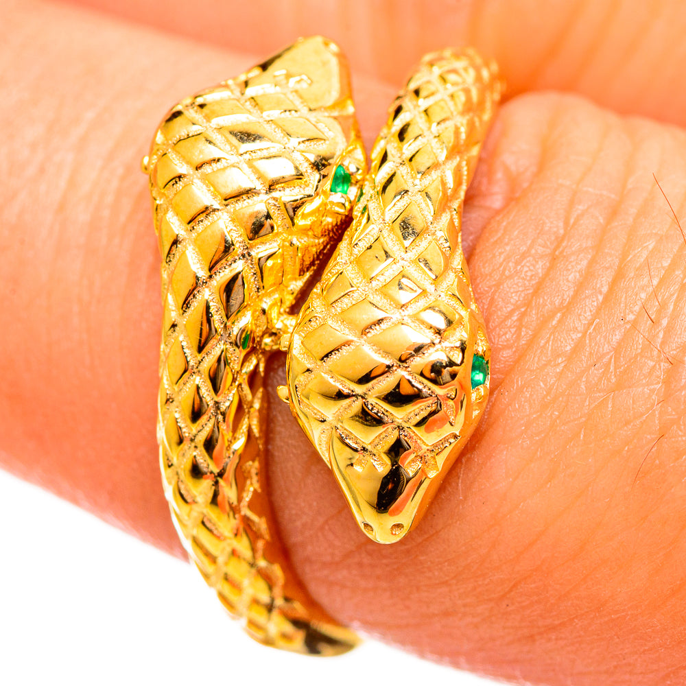 Gold-plated green onyx ring with carved lattice design and small green stone