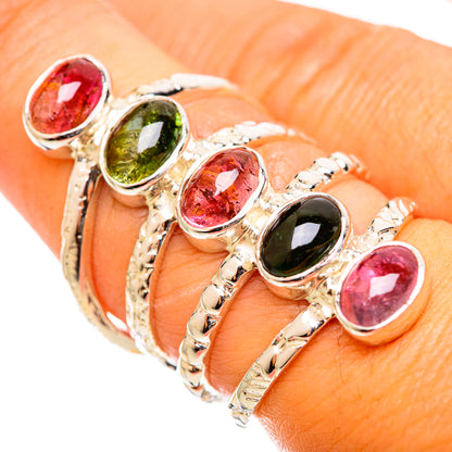 925 sterling silver ring with oval pink, green, and dark stones in bezel settings