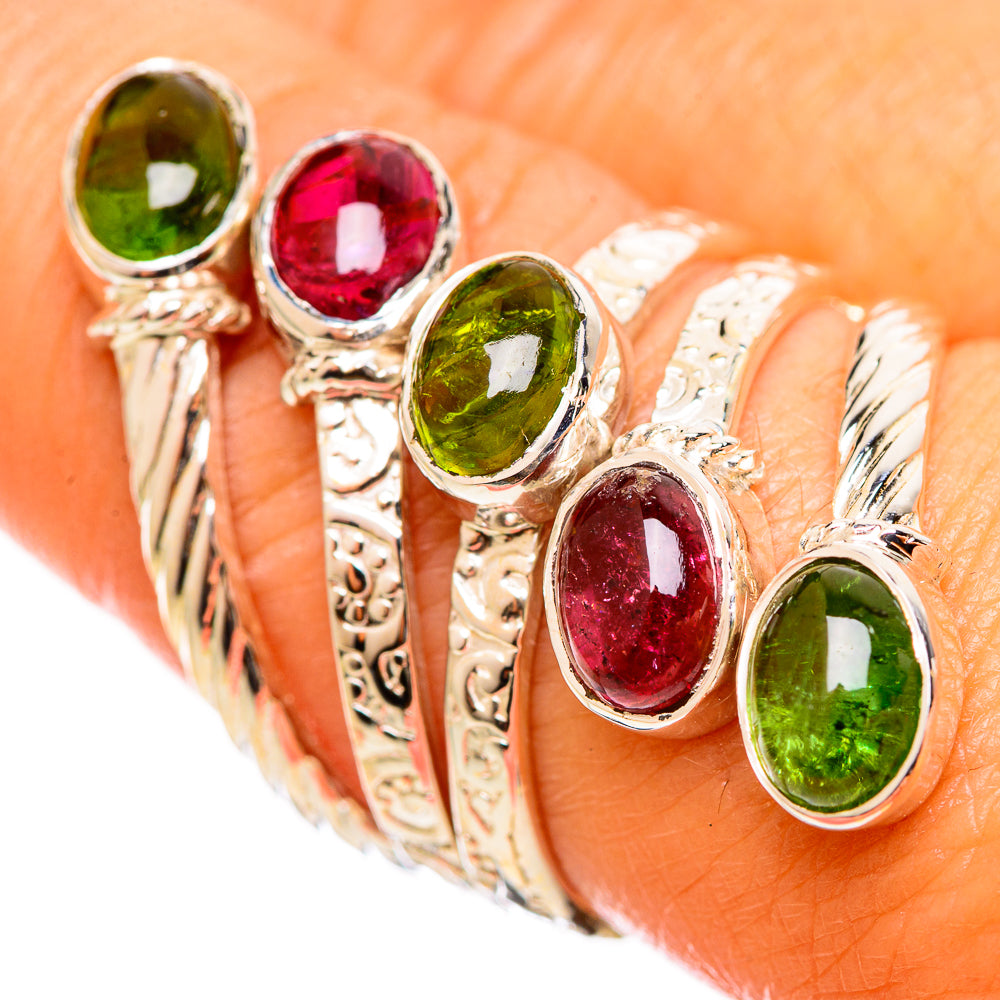 Sterling silver ring with oval green and pink/red gemstones, ornate band detailing