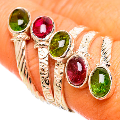 Sterling silver ring with oval green and pink/red gemstones, ornate band detailing