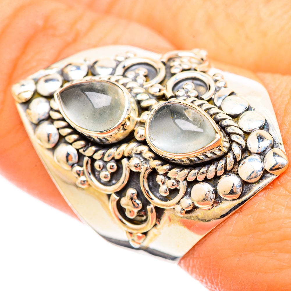 Sterling silver aquamarine cabochon ring with two oval stones and engraved filigree details