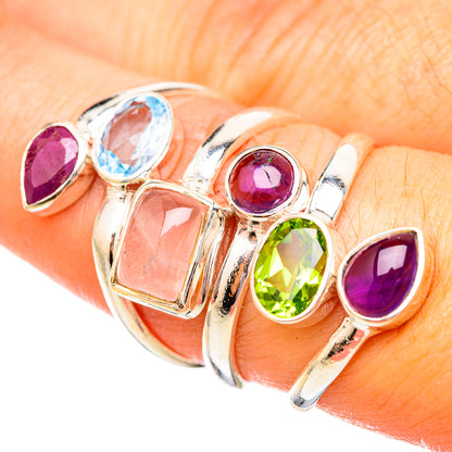 Sterling silver stack ring with green and purple round stones, pink and blue accents