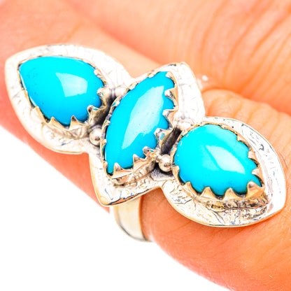 Sterling silver turquoise ring with three teardrop stones and openwork setting
