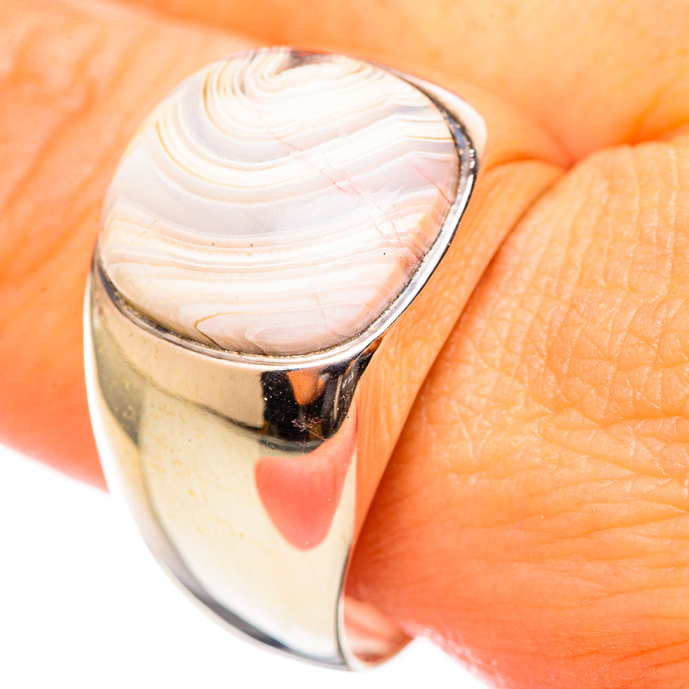 Sterling silver ring with oval white lace agate cabochon, polished metal band