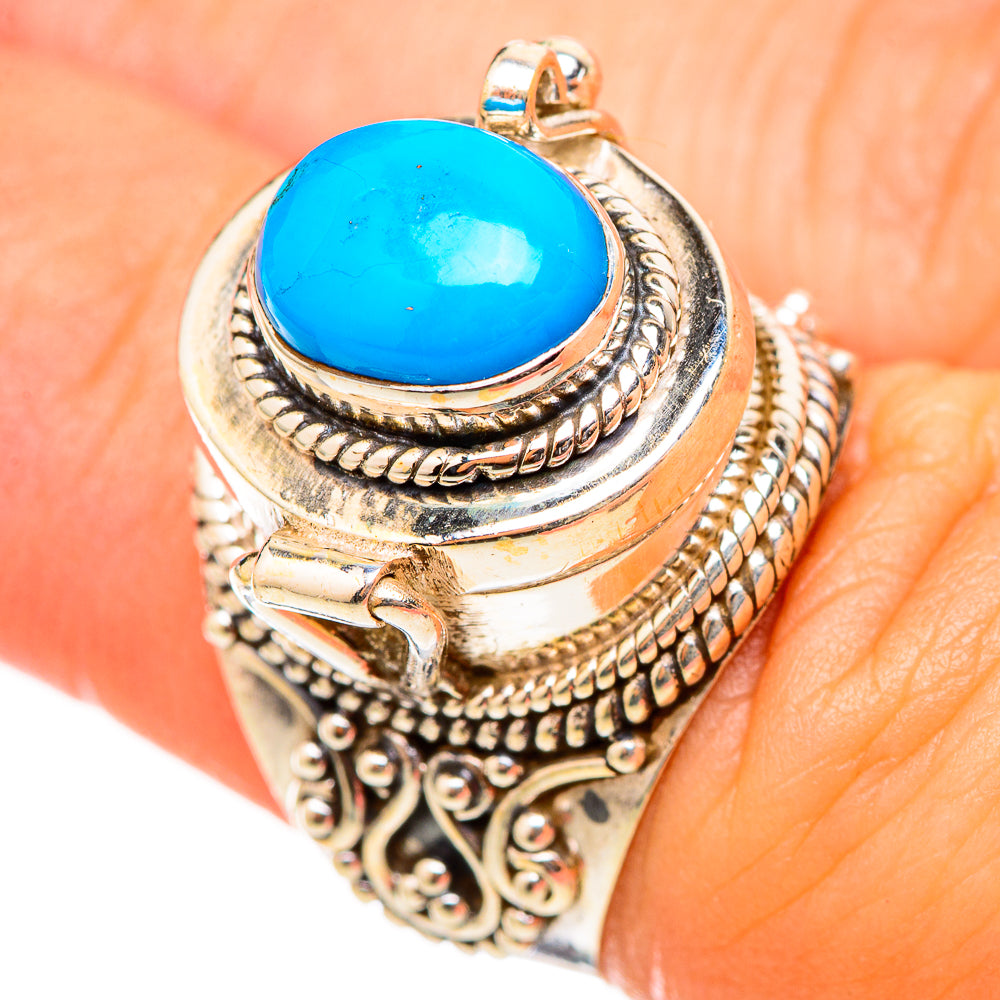 Turquoise oval-stone ring, detailed silver bezel and braided border, size 6