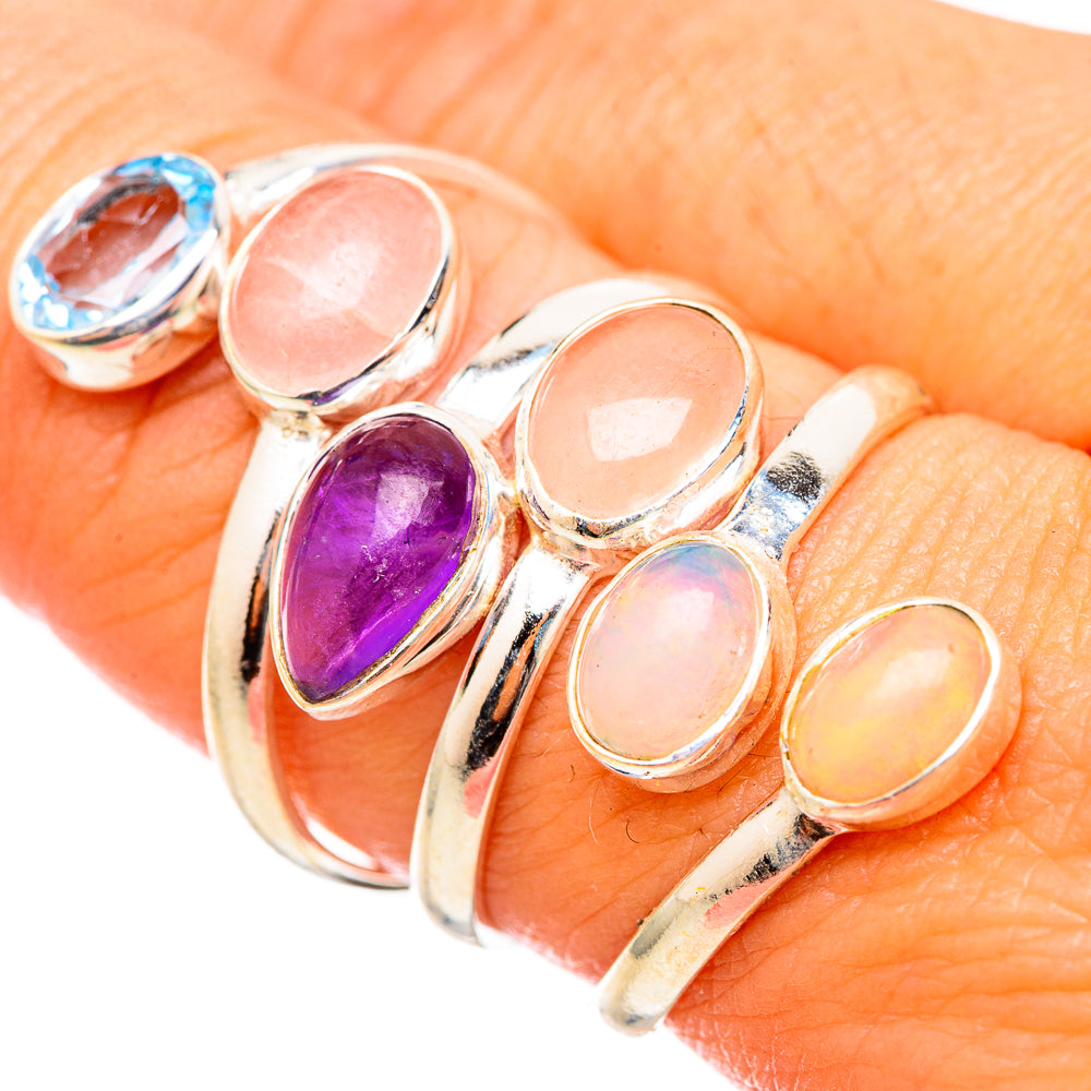 Sterling silver ring with oval opal, purple amethyst, and blue topaz gemstones