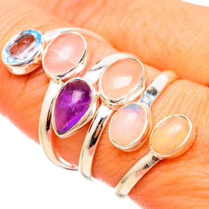 Sterling silver ring with oval opal, purple amethyst, and blue topaz gemstones