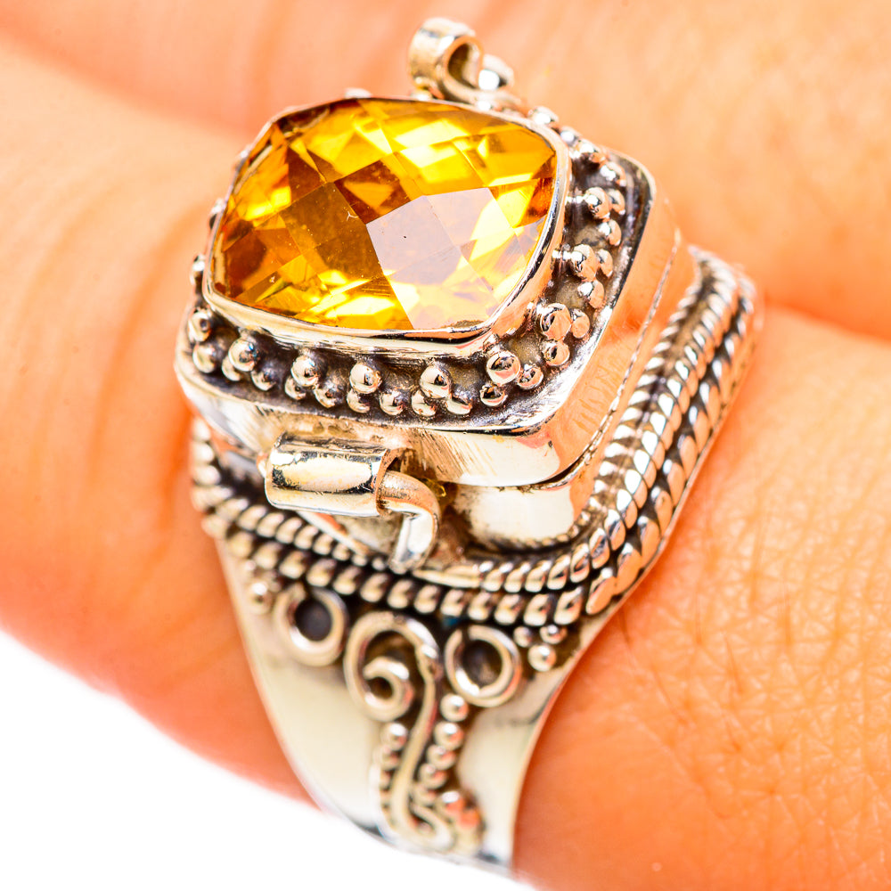 Sterling silver citrine ring with large faceted oval yellow stone, detailed bezel