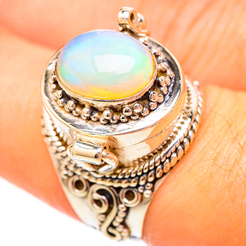 Sterling silver opal ring, oval opal top with rainbow sheen and textured braided bezel