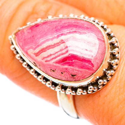 Rhodochrosite teardrop cabochon ring, pink stone with wavy bands, beaded sterling silver