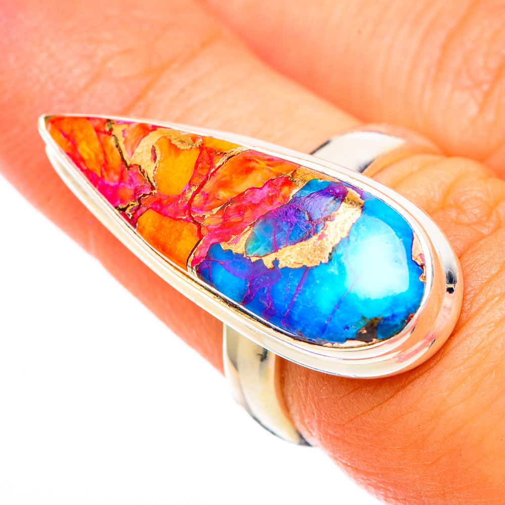 Sterling silver ring featuring an oval multicolor stone in red, orange, and blue