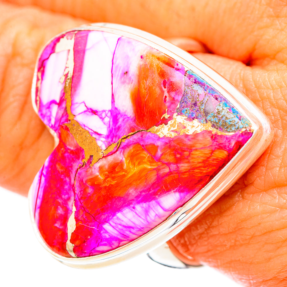 Heart gemstone ring with vivid pink-orange pattern in a polished silver setting