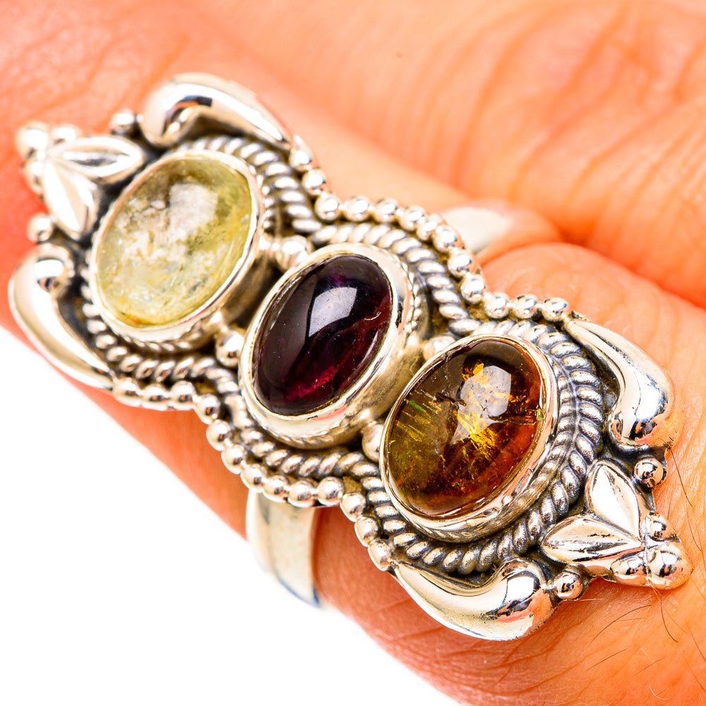 925 sterling silver ring with three oval gemstone cabochons: pale yellow, dark red, amber