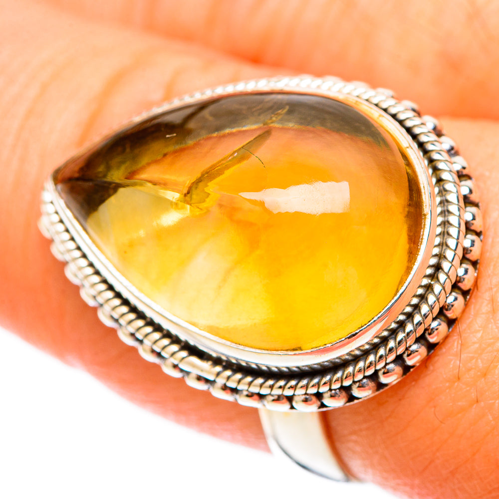 925 sterling silver citrine sugarloaf ring with faceted yellow gemstone, close-up
