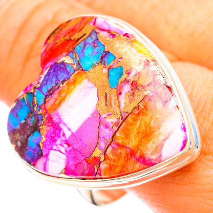 Sterling silver heart ring with multicolor opal-like stone, turquoise, pink, and orange.