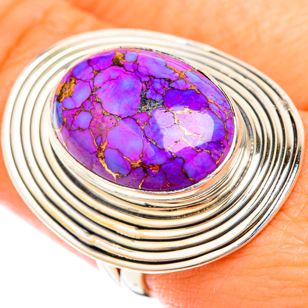 Sterling silver ring with large oval purple turquoise cabochon, ribbed band
