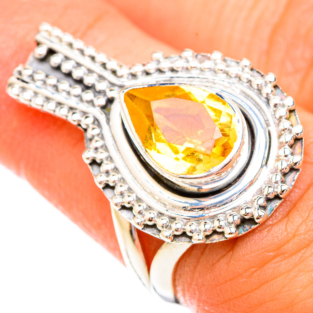 Sterling silver ring with oval faceted citrine gemstone and beaded halo, size 6.5