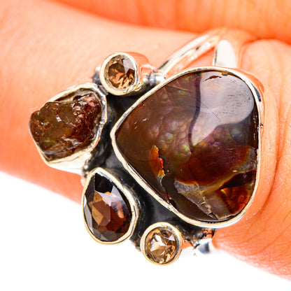 Sterling silver gemstone ring with large smoky brown oval cabochon and four gold accents