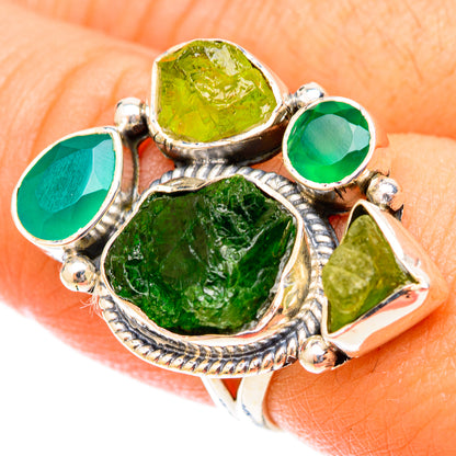 Sterling silver green gemstone ring with round and teardrop settings, textured band