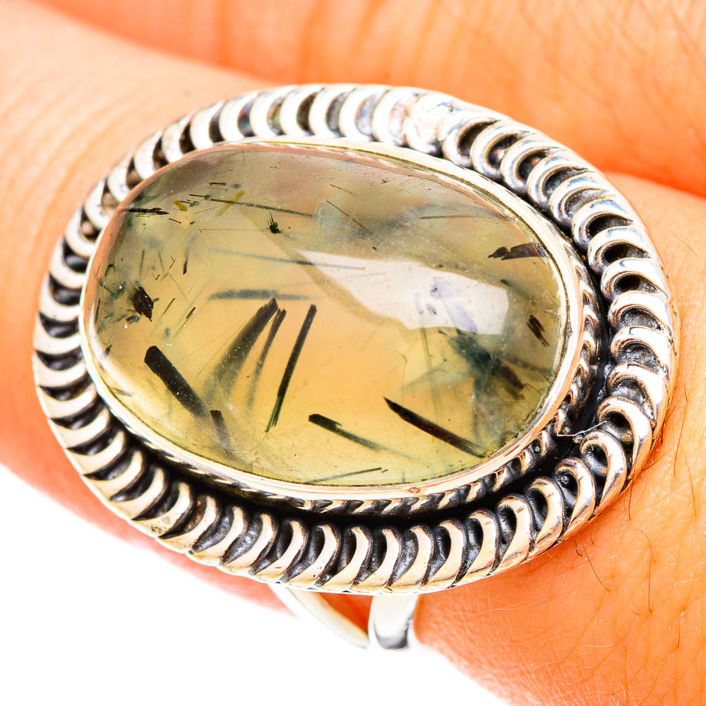 Prehnite oval ring with ridged 925 sterling silver band, worn on finger