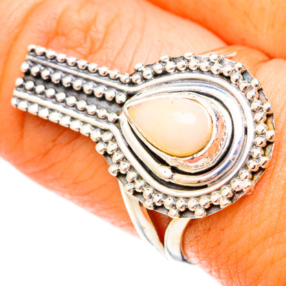 Sterling silver opal ring with oval yellow stone and beaded halo, size 8.5