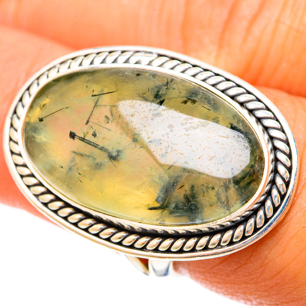 Sterling silver ring with large oval green prehnite stone and braided edge setting, 6.5