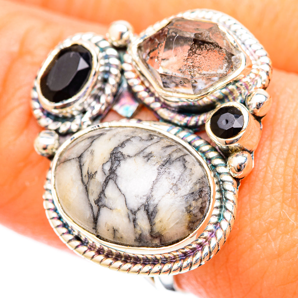 Silver statement ring with large marbled oval stone, black onyx, and irregular crystal top, rope bezel