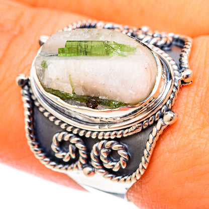 Oval quartz ring with green tourmaline in sterling silver, ornate braided bezel