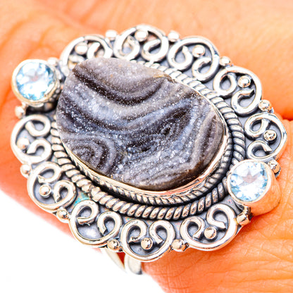 Sterling silver oval desert druzy ring with blue topaz accents, ornate filigree bezel