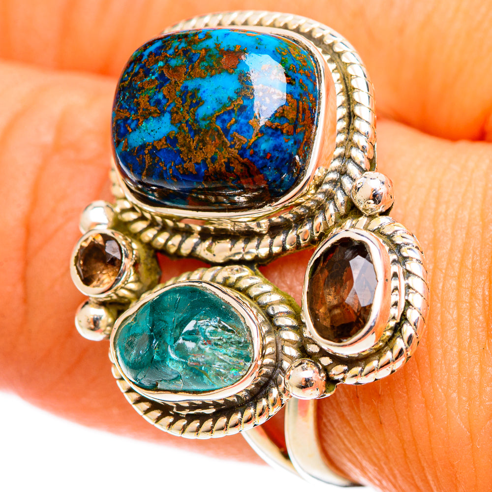 Sterling silver gemstone ring with large blue oval stone and teal oval, smoky brown settings