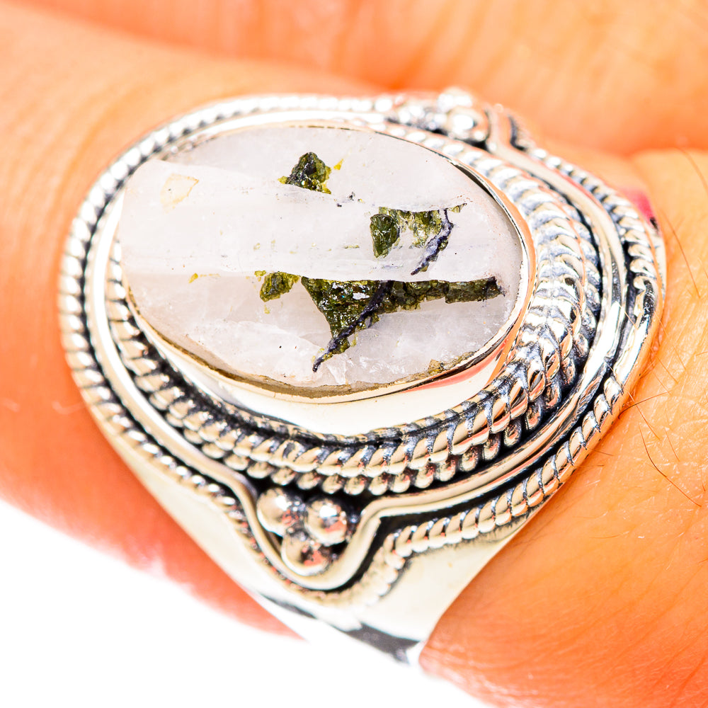 Sterling silver oval ring with white quartz center and green tourmaline specks