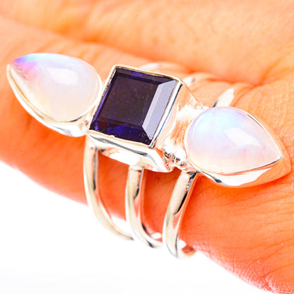 Sterling silver ring with dark faceted square stone and two opal teardrop stones