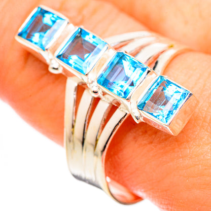 925 sterling silver ring, four blue topaz square stones on band; close-up