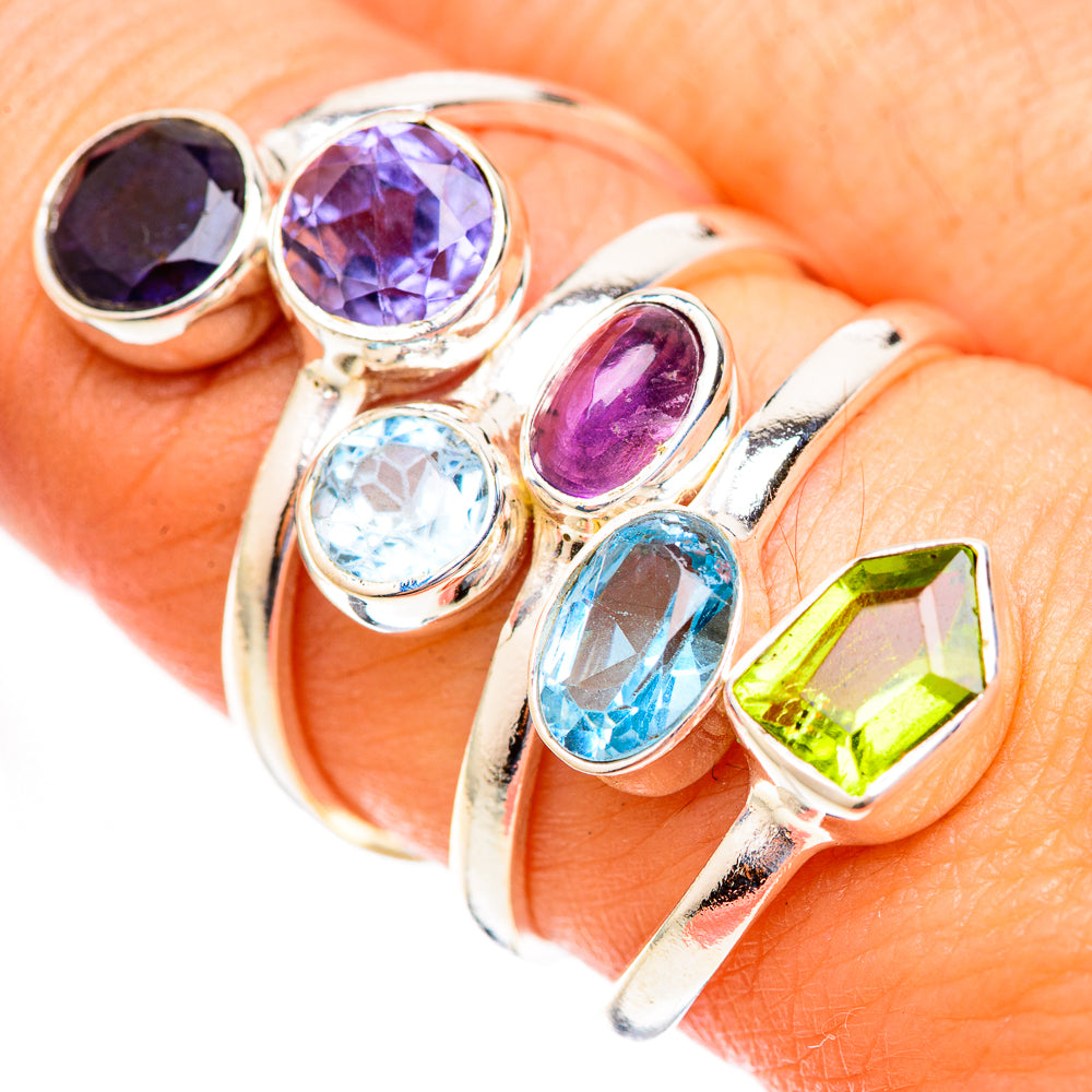 Sterling silver multi-gem ring with purple, blue, and green oval stones, close-up