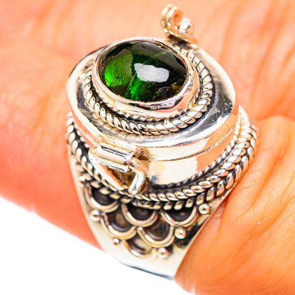 Sterling silver tourmaline ring with oval green stone and braided rope halo bezel
