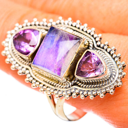 Sterling silver ring with large purple rectangular center and two purple teardrop stones