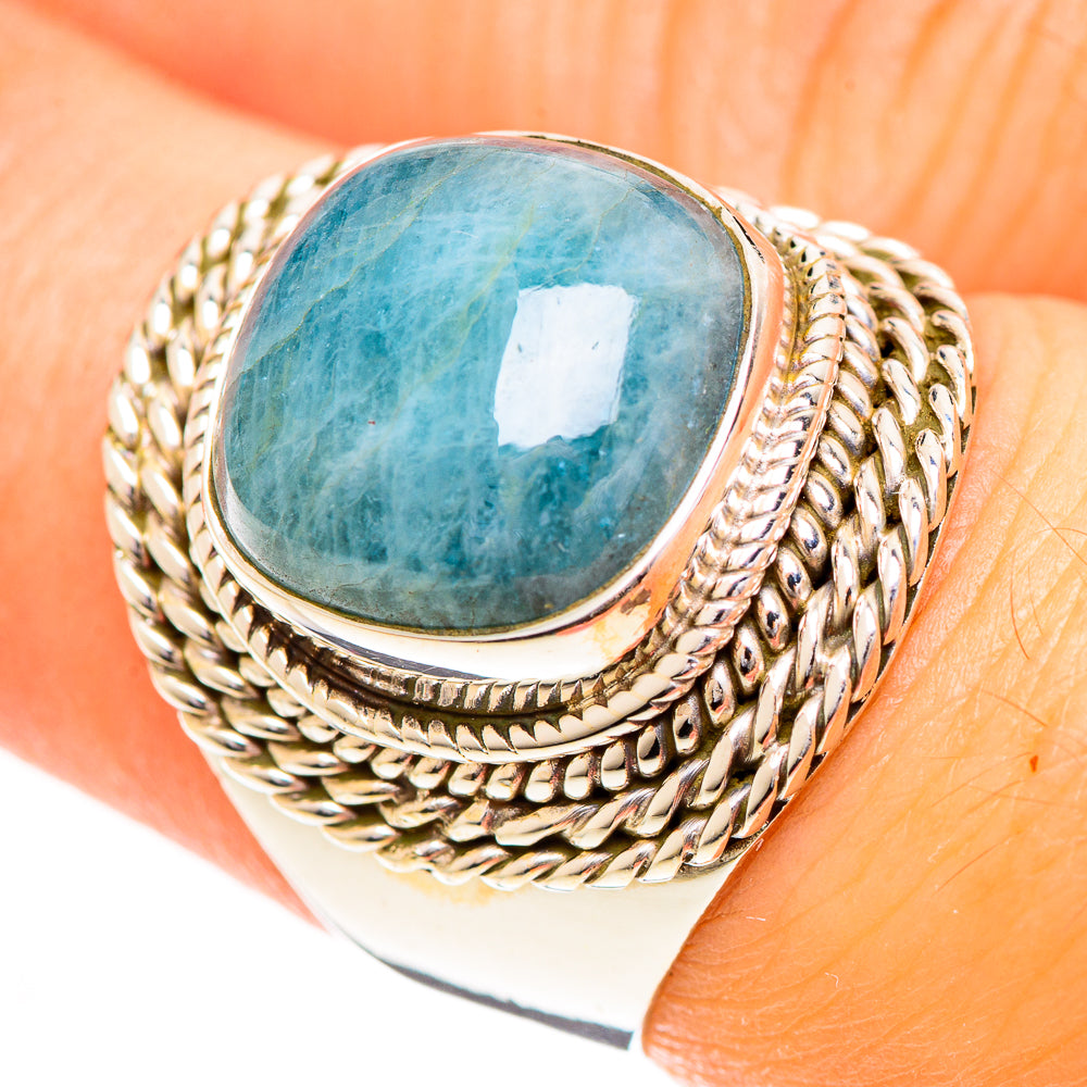 Sterling silver aquamarine oval ring with braided rope bezel