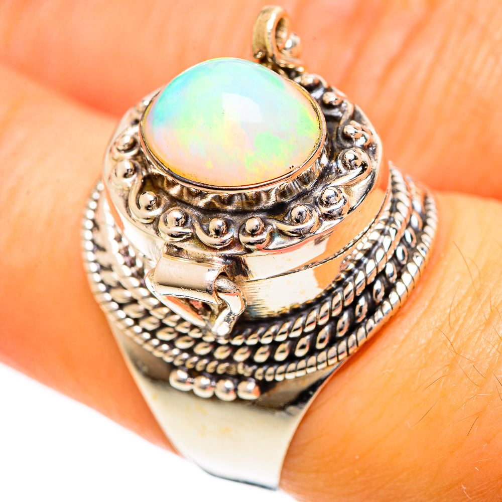 Sterling silver opal ring, oval opal cabochon with colorful glow, detailed side patterns