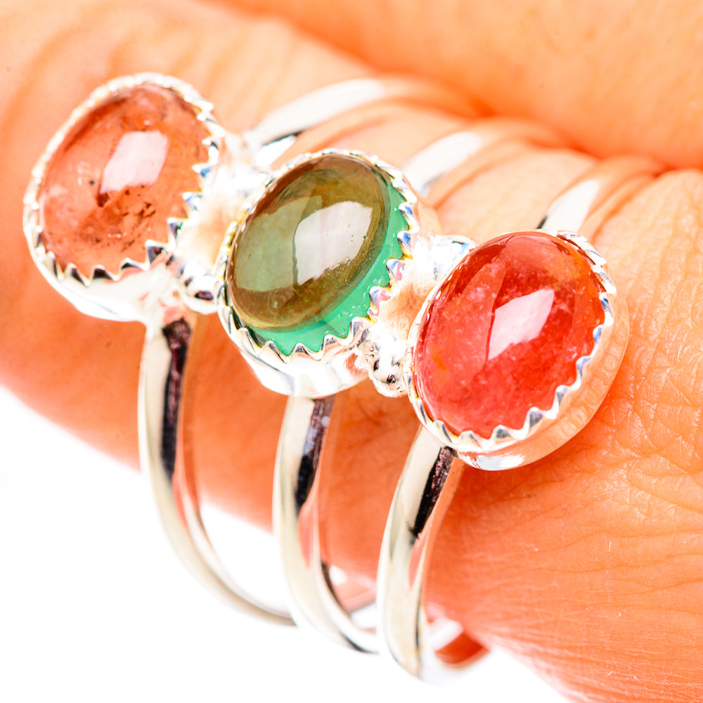 Sterling silver tourmaline ring, close-up of green and red oval stones with prong settings