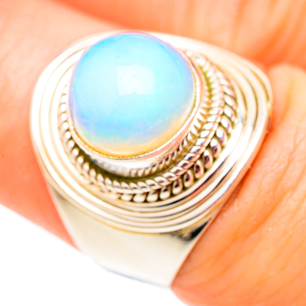 Sterling silver oval opal ring close-up with blue opal and ornate beaded borders