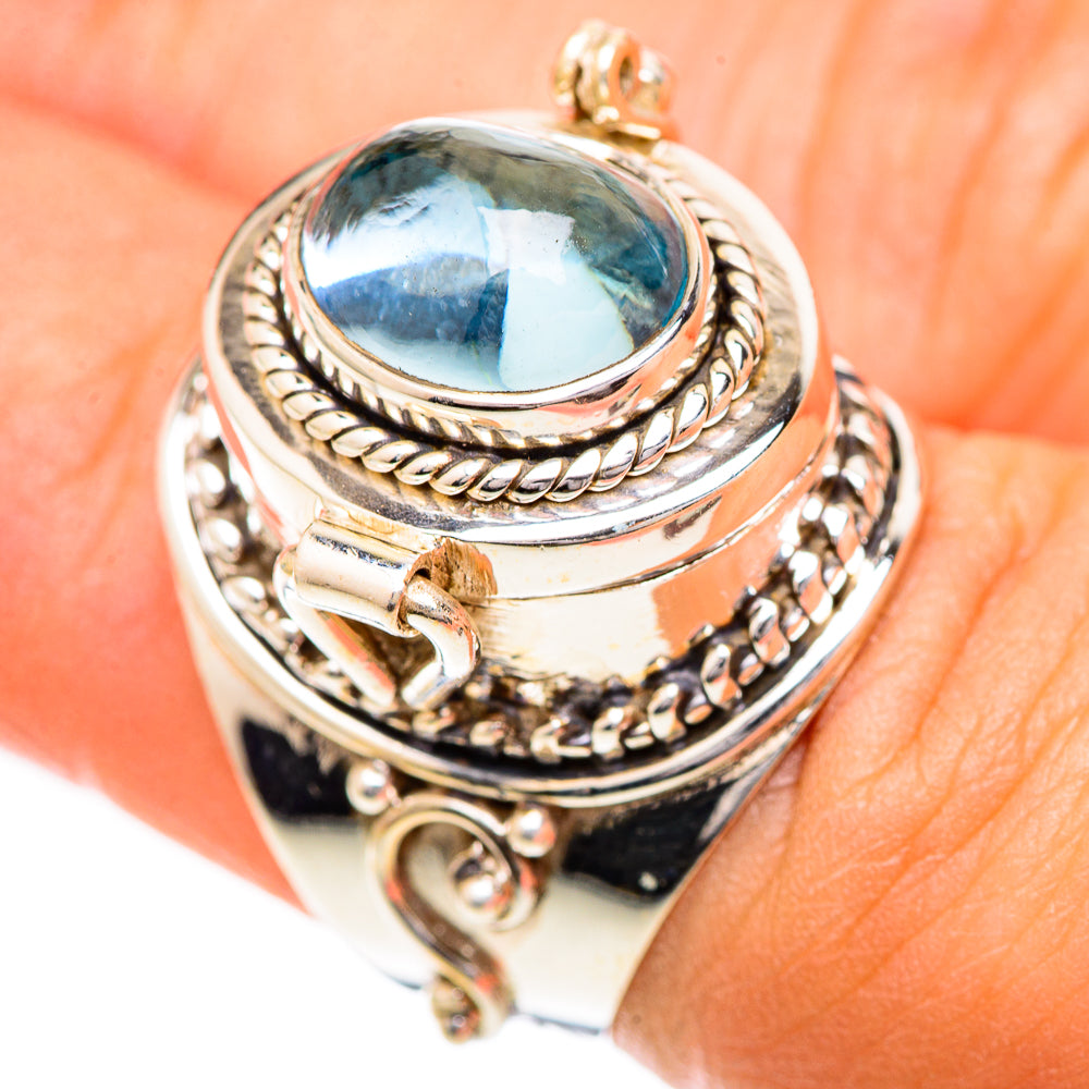 Sterling silver ring with oval aquamarine cabochon and rope bezel details