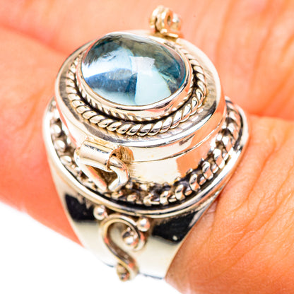 Sterling silver ring with oval aquamarine cabochon and rope bezel details